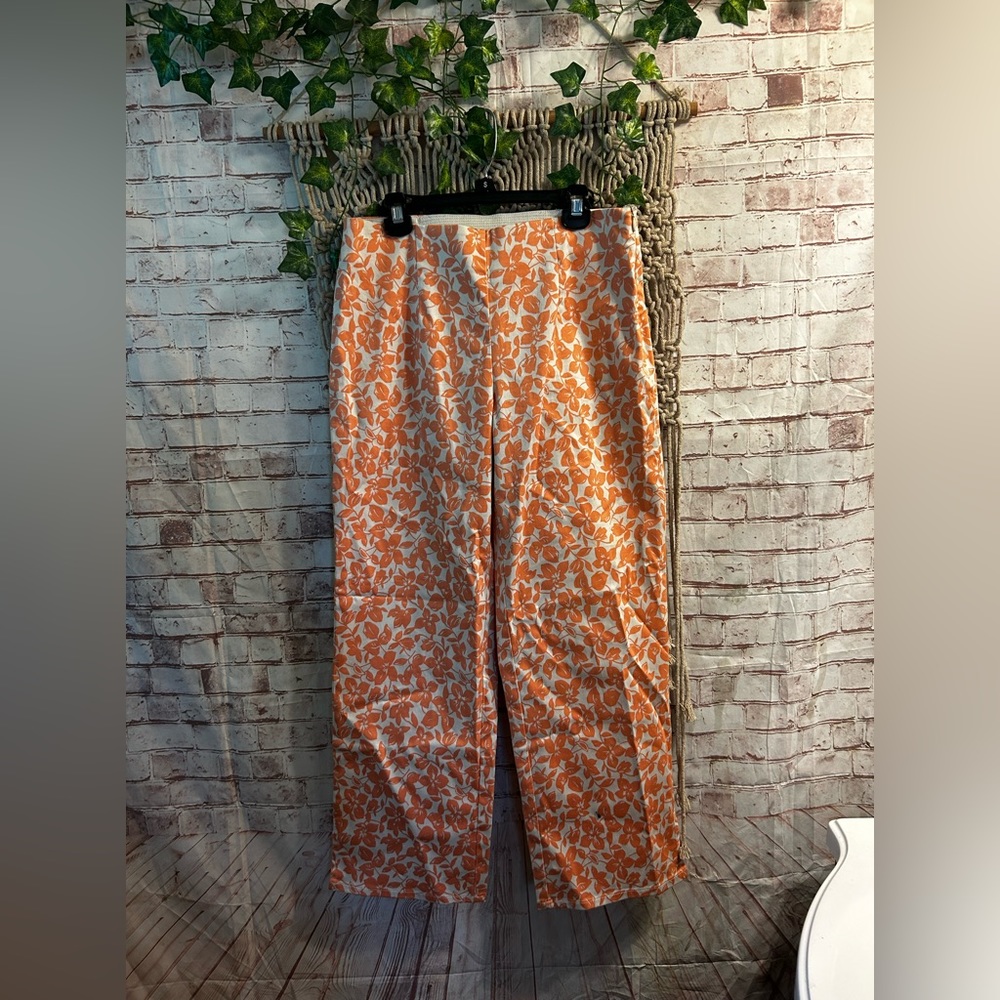 orange and white studio m pants